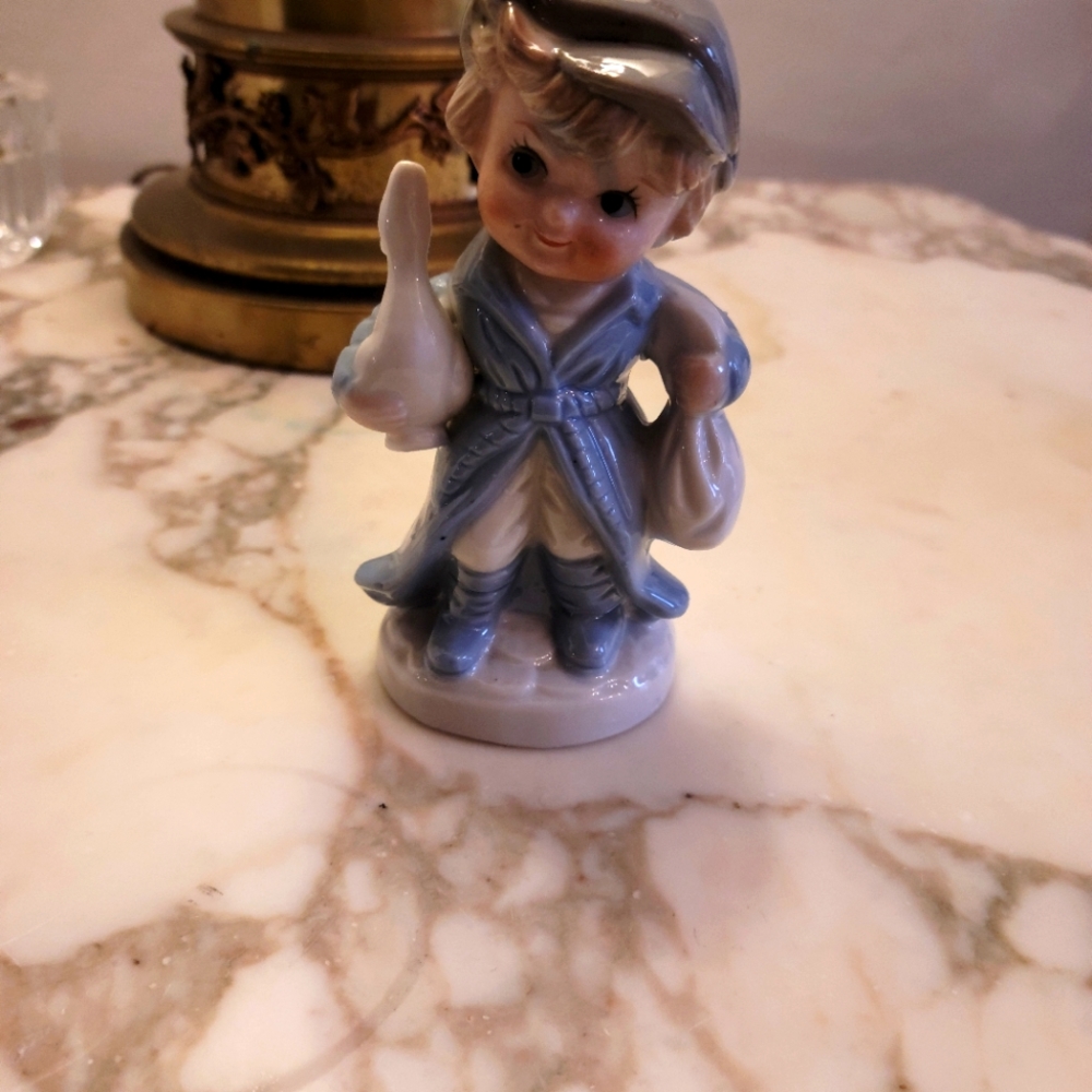 Vtg. KPM BOY HOLDING DUCK